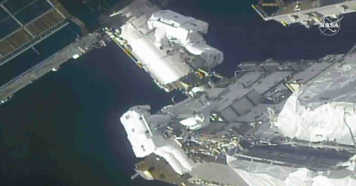 Spacewalking astronauts prep station for new solar wings